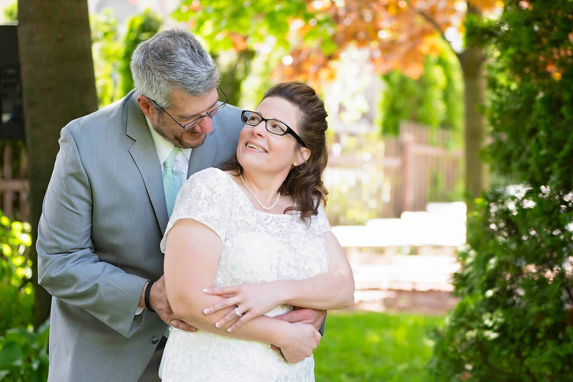 Husband & Wife at Spring Wedding at The Gardens in Allenton, WI